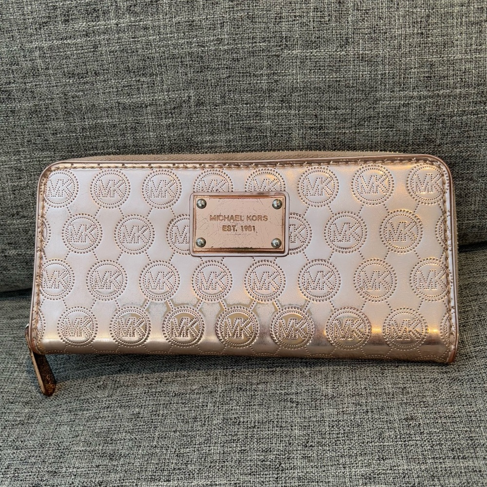 Michael Kors monogram rose Gold Wallet in good condition